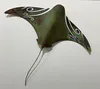 A sculpture of a copper Pacific stingray with Maori designs by New Zealand artist Daniel Wright, available in The Little Gallery Tairua